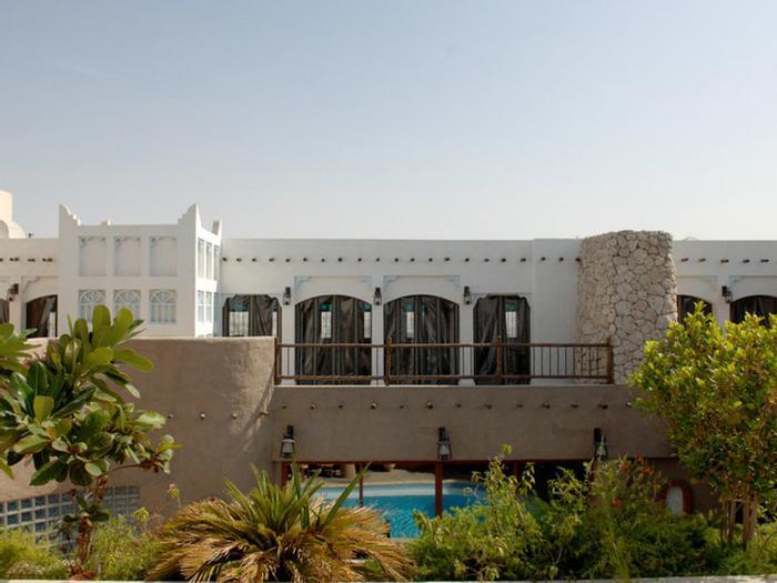 Al Liwan Suites Hotel - Bild 1